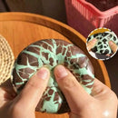 1pc Handmade Mint Dark Chocolate Squeeze Ball, slow rebound with crispy and soft texture. Relieves stress and anxiety for all genders. Nice as party favors and holiday gifts.