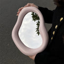 An irregular shaped ceramic makeup mirror simple design desktop decorative mirror bedroom living room dressing mirror decorative