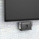 Monzlteck 壁挂式支架，适用于任天堂 Switch（兼容 OLED 版），可安装在电视旁或电视后，节省空间